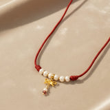 Pearl and Bow Medium Cord Choker