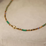 Green and gold beaded necklace